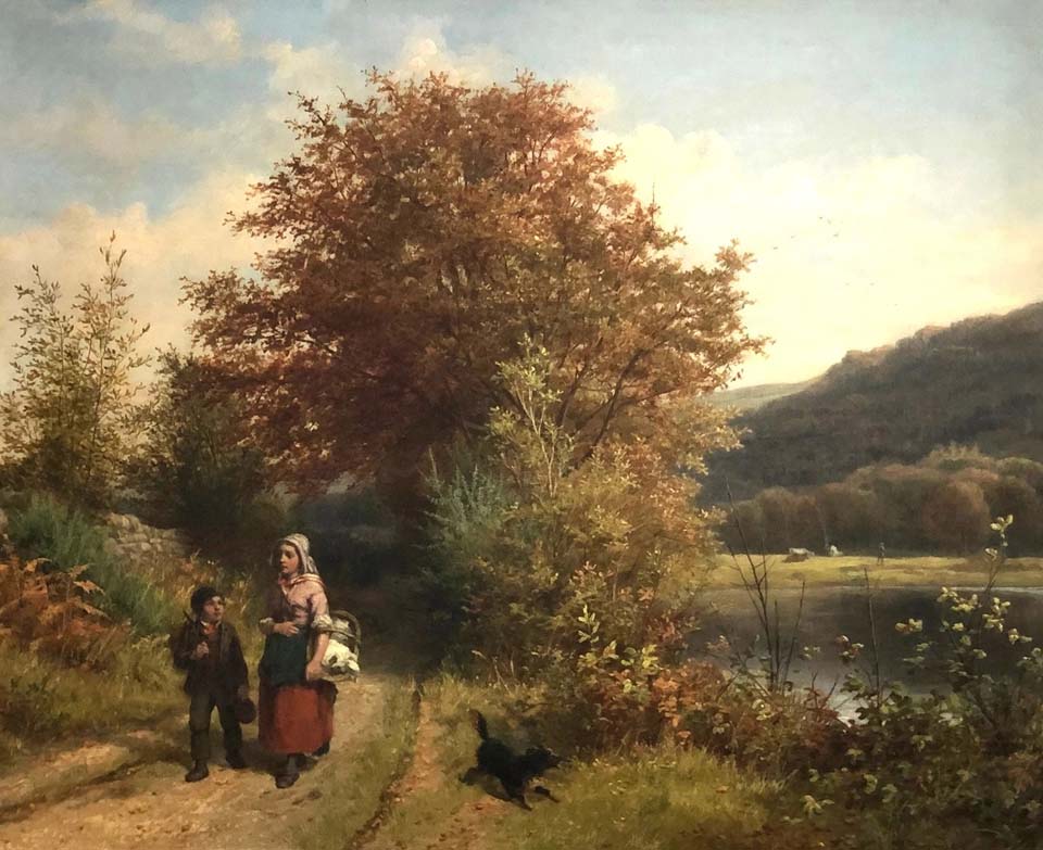 Chidren and a dog on a country path