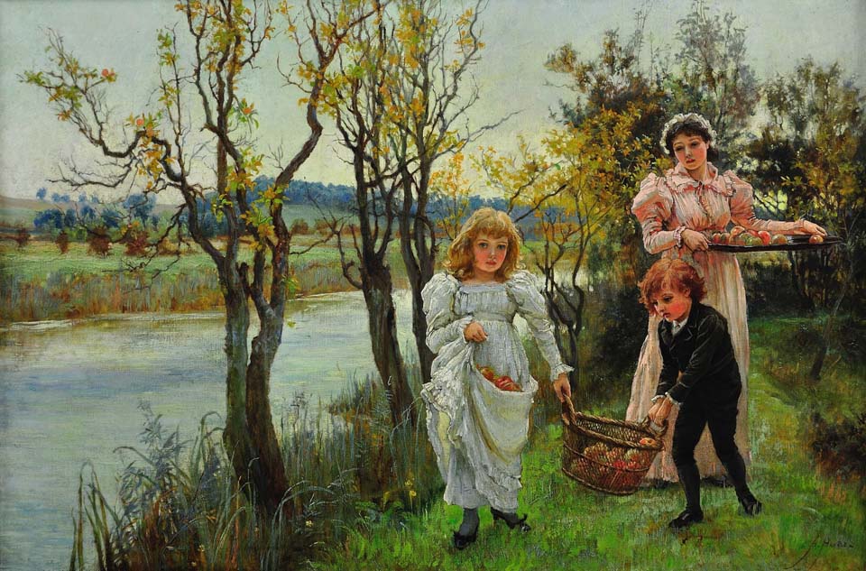 Family collecting autumn windfalls