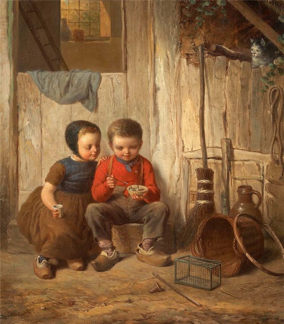 Two children with holding bird's nest
