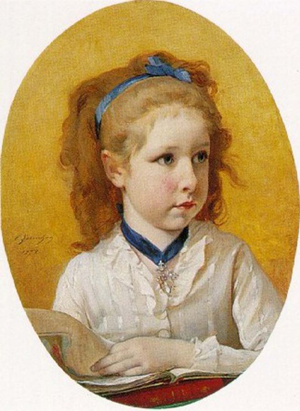 Young girl with a blue ribbon