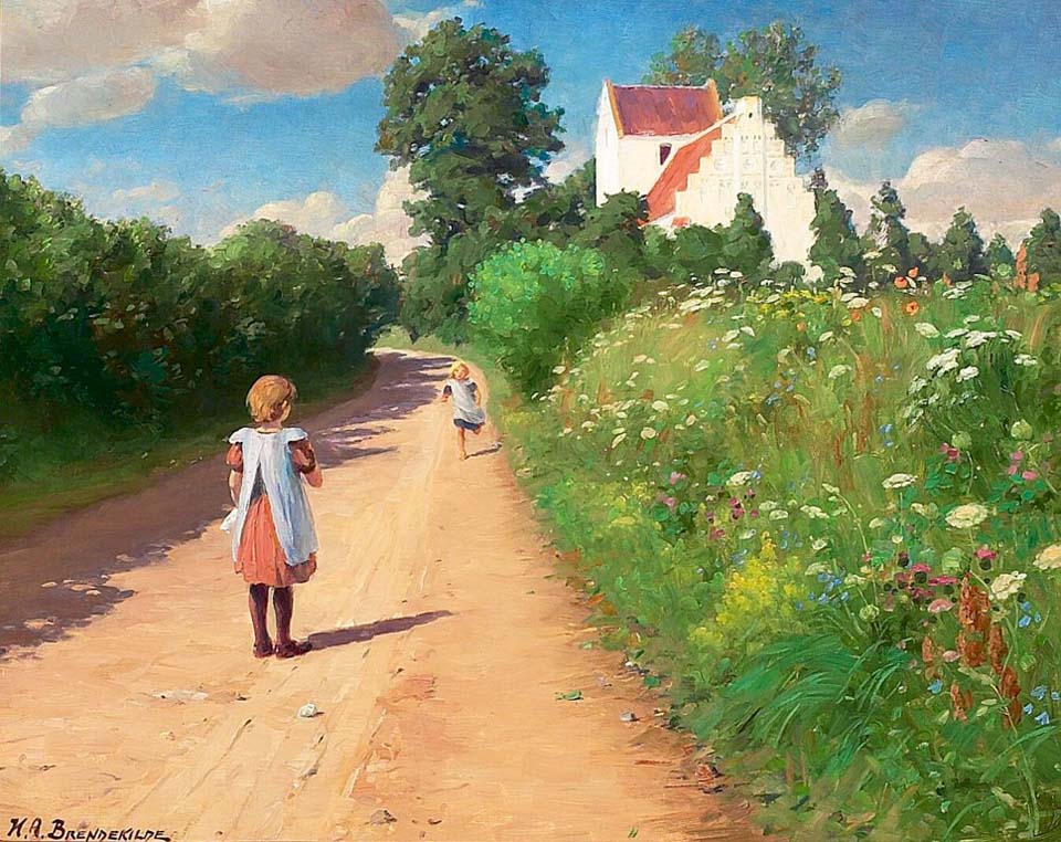 Little girls playing outside the church of Brændekilde on a warm summerday
