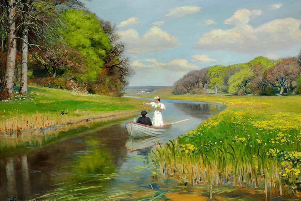 Spring - a young couple in a rowing boat