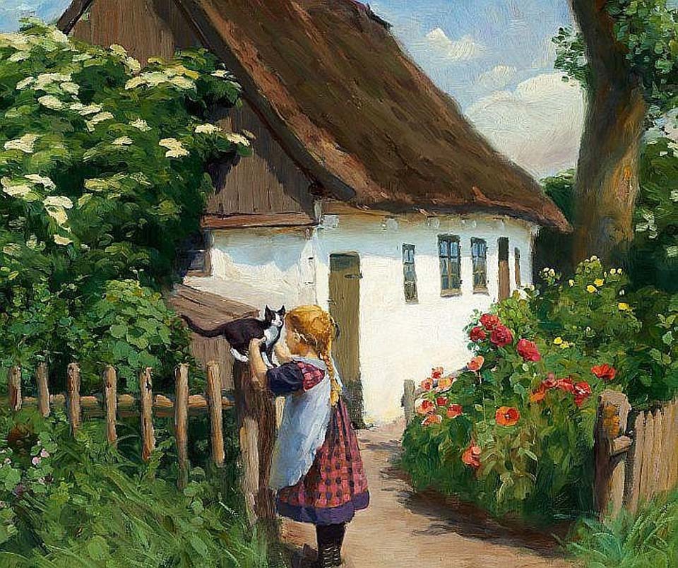 Summer day in the village with a little girl and a kitten