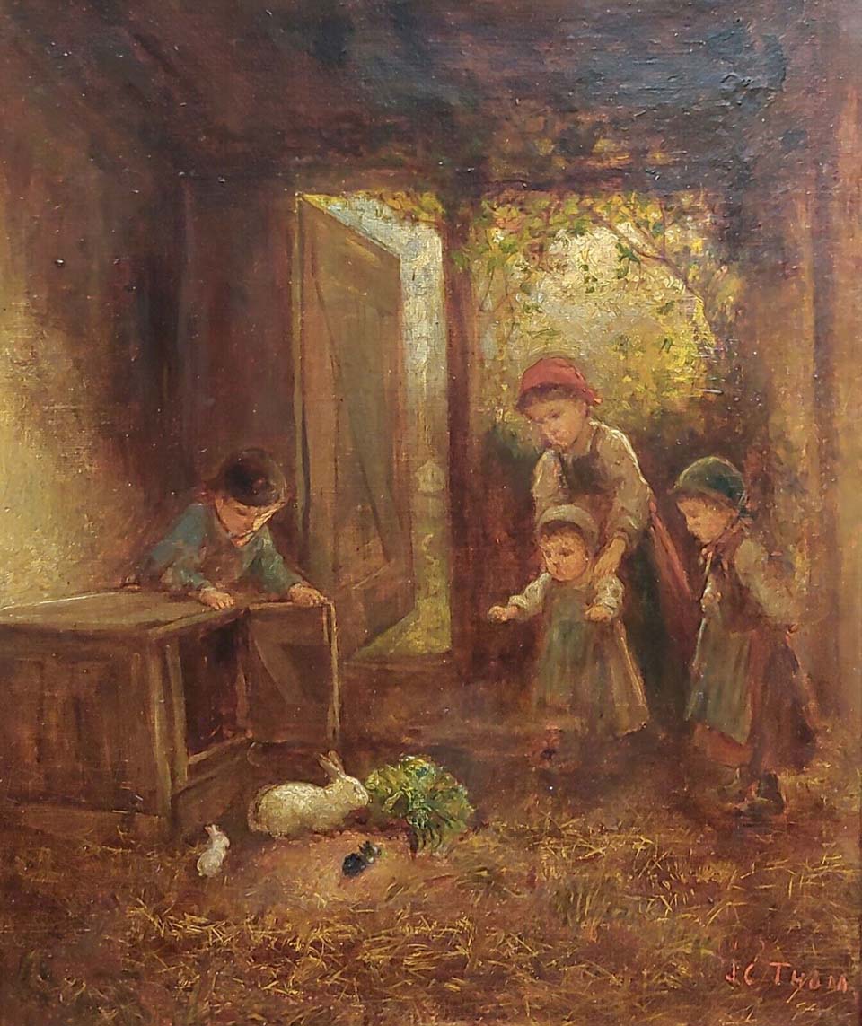 Children feeding a rabbit and her babies